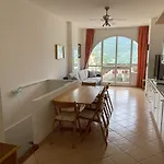 Di *